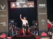 Pierre Paturel celebrates after finishing the Ironman 70.3 Port Macquarie on May 5, 2024. Picture by @NorthSouth 